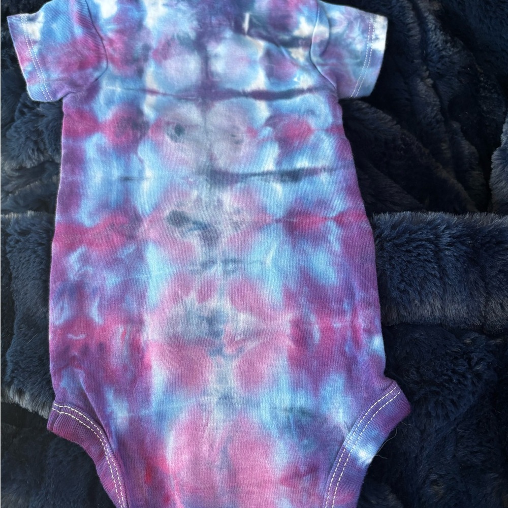 Vibrant Pink and Blue Bodysuit with Tie-Dye Swirls